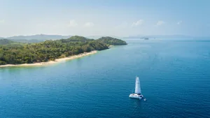 Lagoon 56 OO7 — aerial view off an island