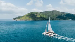 Lobster 78 — sailing off an island