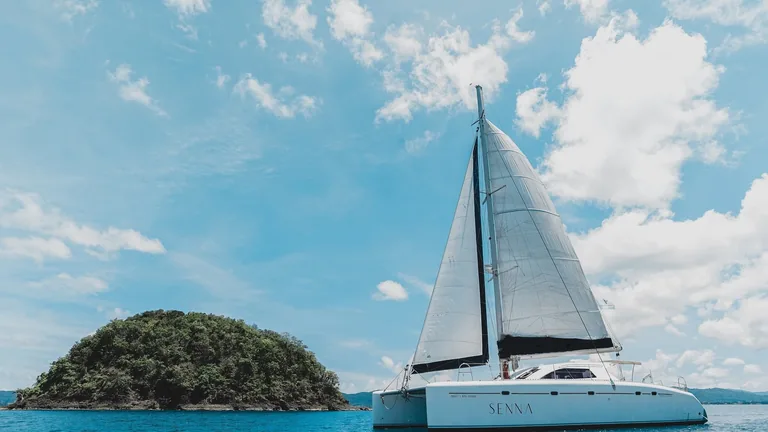 Nautitech 47 Senna — sailing off an island